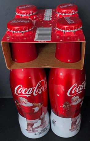 P06022-4 € 5,00 coca cola ALU flesje afb. kerstman in de Sneeuw Flesjes zijn per stuk 5 euro.jpeg